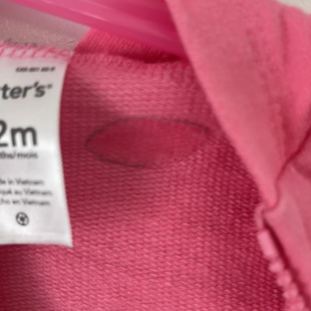 Carter’s pink sweatshirt with Pom Poms